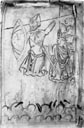 Библейский «Голиаф» из манускрипта XI в., одетый по англосаксонской  моде. Его меч крепится на узкой перевязи, которая петлей перекинута вокруг плеча, а не под рукой (ошибка художника). Туника типичного для темных веков фасона со сборенными рукавами и декоративной вставкой на вороте, перевязанной шнуром. Маловероятно, что обод щита был металлическим, скорее он был выполнен из  твердой кожи, фиксирующей края щита, и затем уже искусно раскрашенной. Фигуры справа одеты в плащи, скрепленные на правом плече круглыми брошами.  (Британская библиотека, Ms. Cotton Tiberius C VI)
